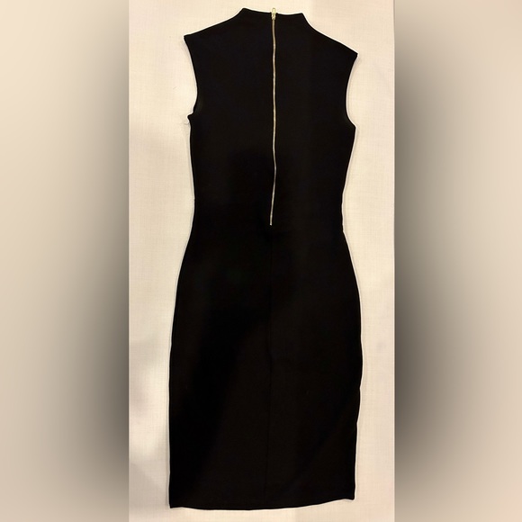 Black cocktail dress with gold zipper down the back. - Picture 3 of 5